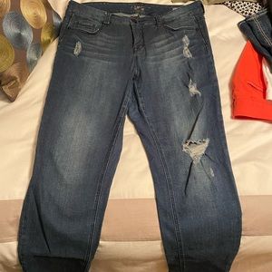 Distressed, straight leg jeans.